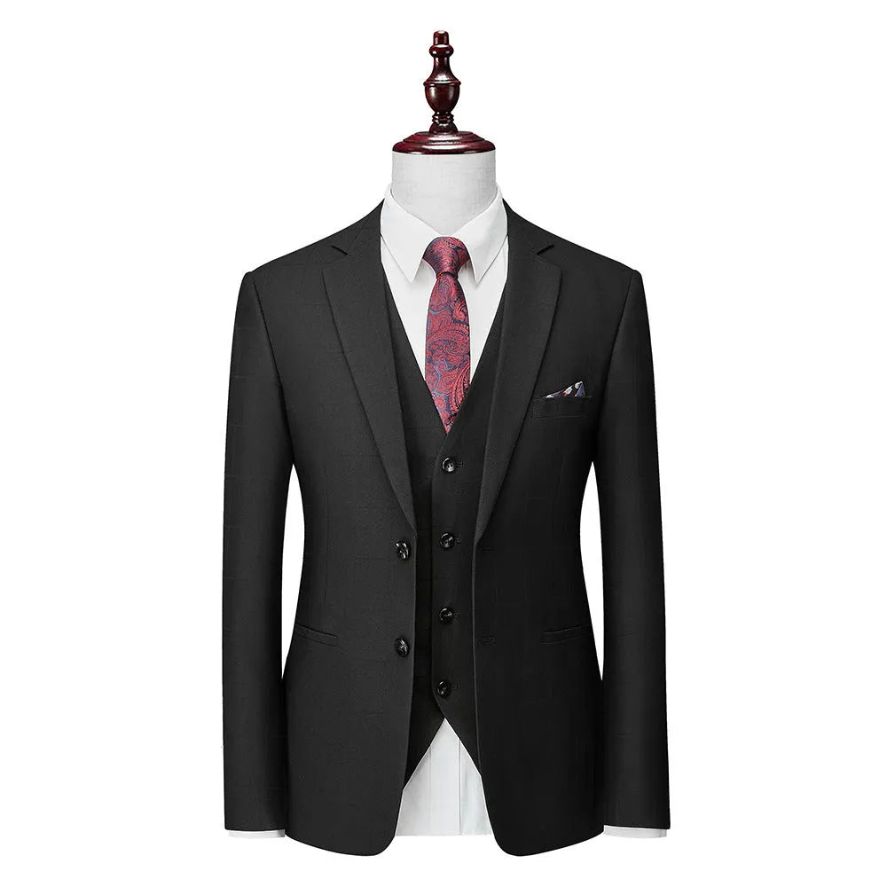 Men's navy blue slim fit three-piece suit with jacket, vest, and trousers on a hanger.