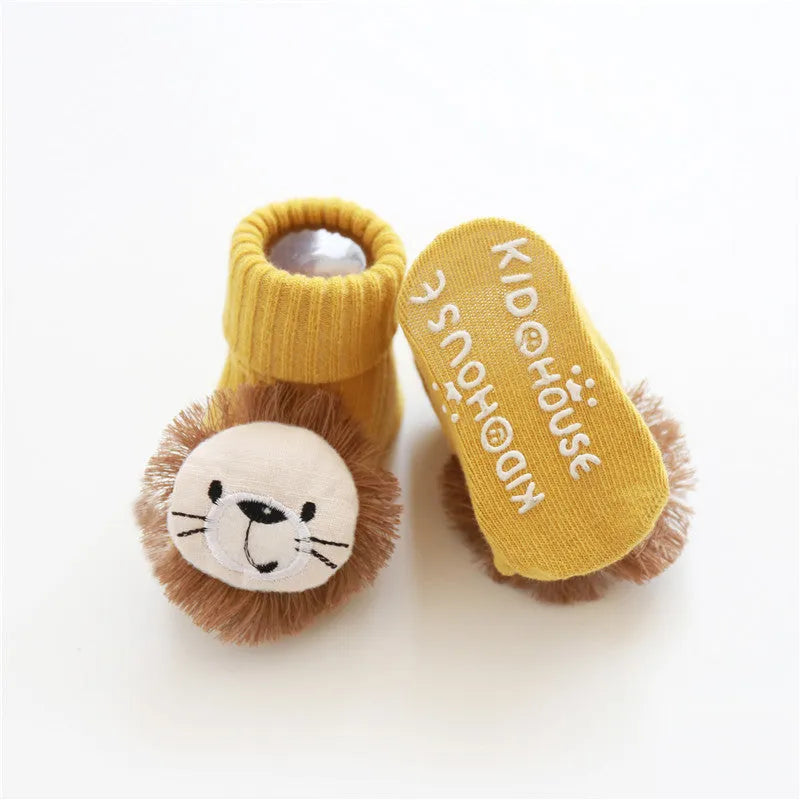 Cotton baby socks in multiple colours including blue bow and pink stars on a white background