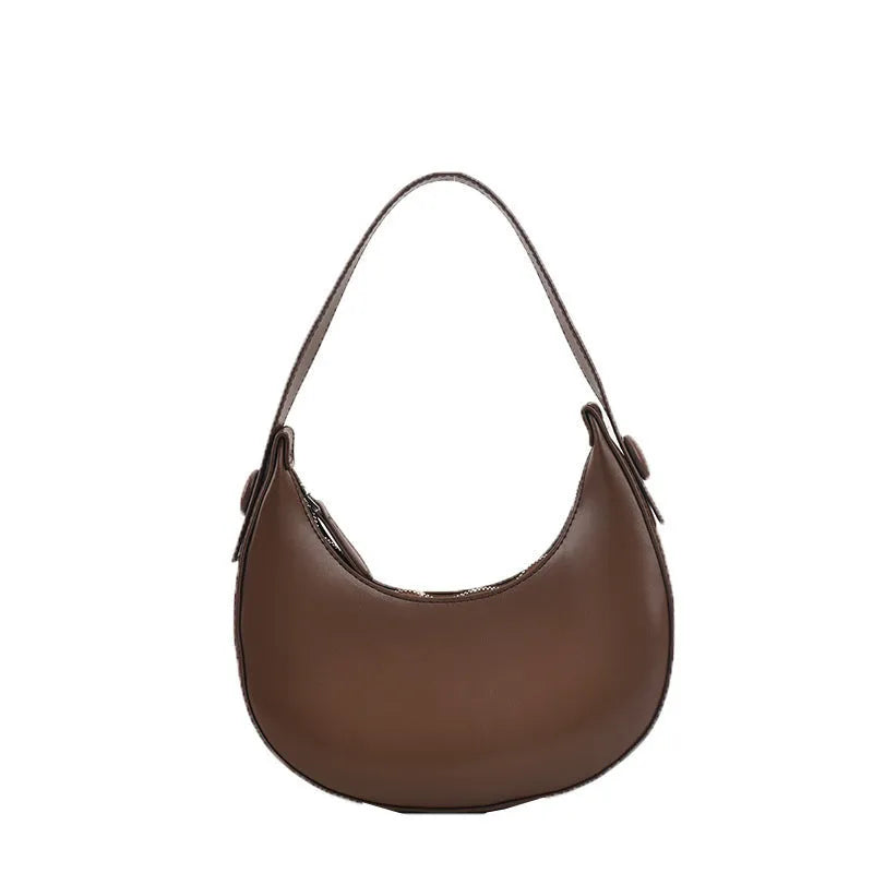 Women's retro dumpling-shaped shoulder bag in PU leather, shown in black, featuring an outer sandwich pocket.