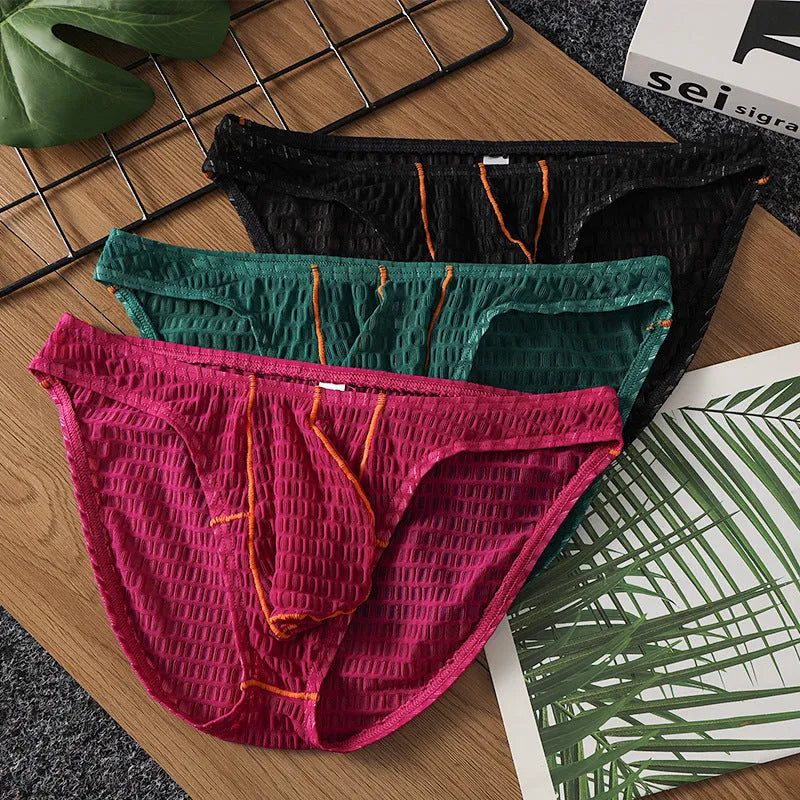Men's ice silk lace low-waist briefs in solid colours: black, white, green, rose red, and light purple.
