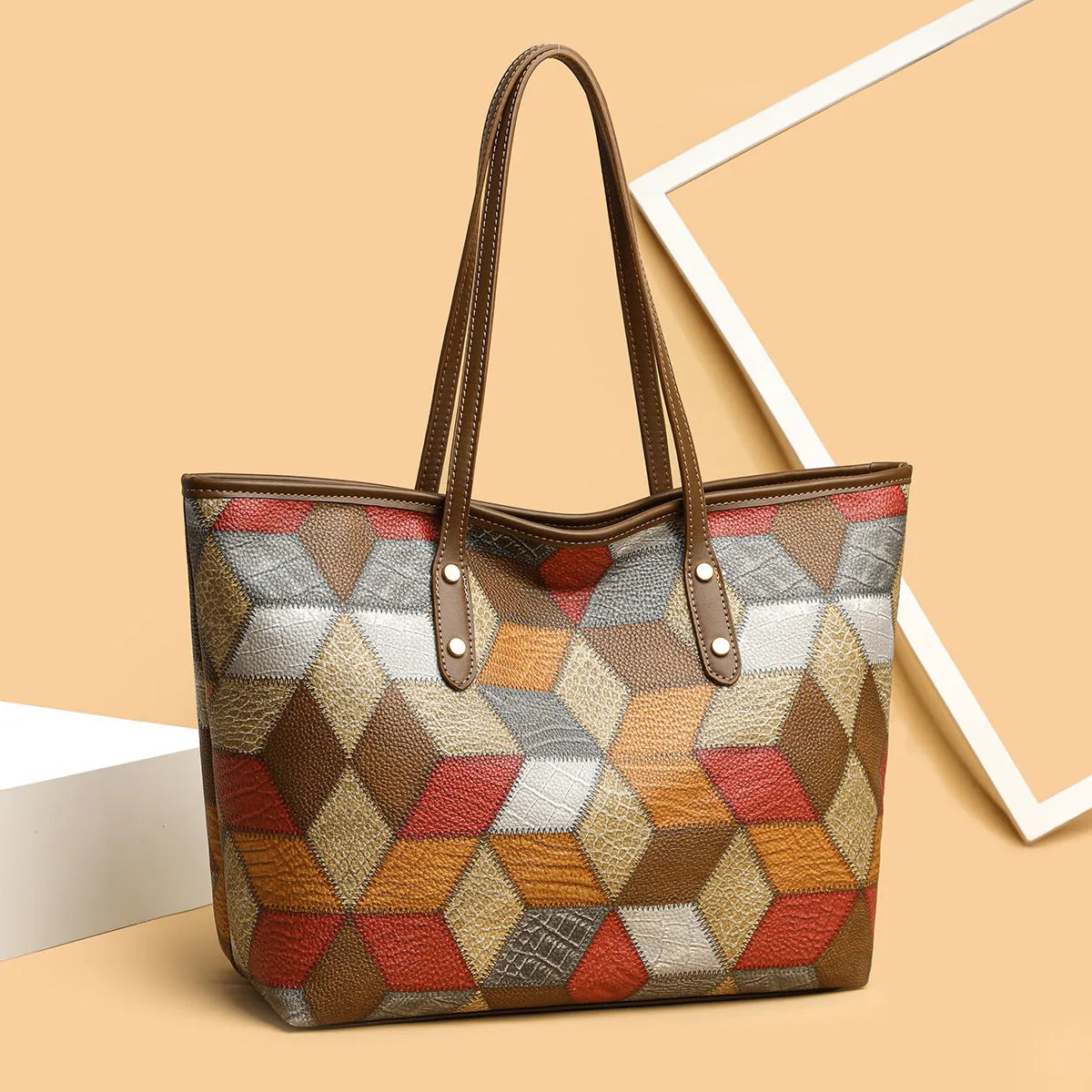Women's PVC shoulder handbag in blue brown colour with sandwich pocket design for business commuting