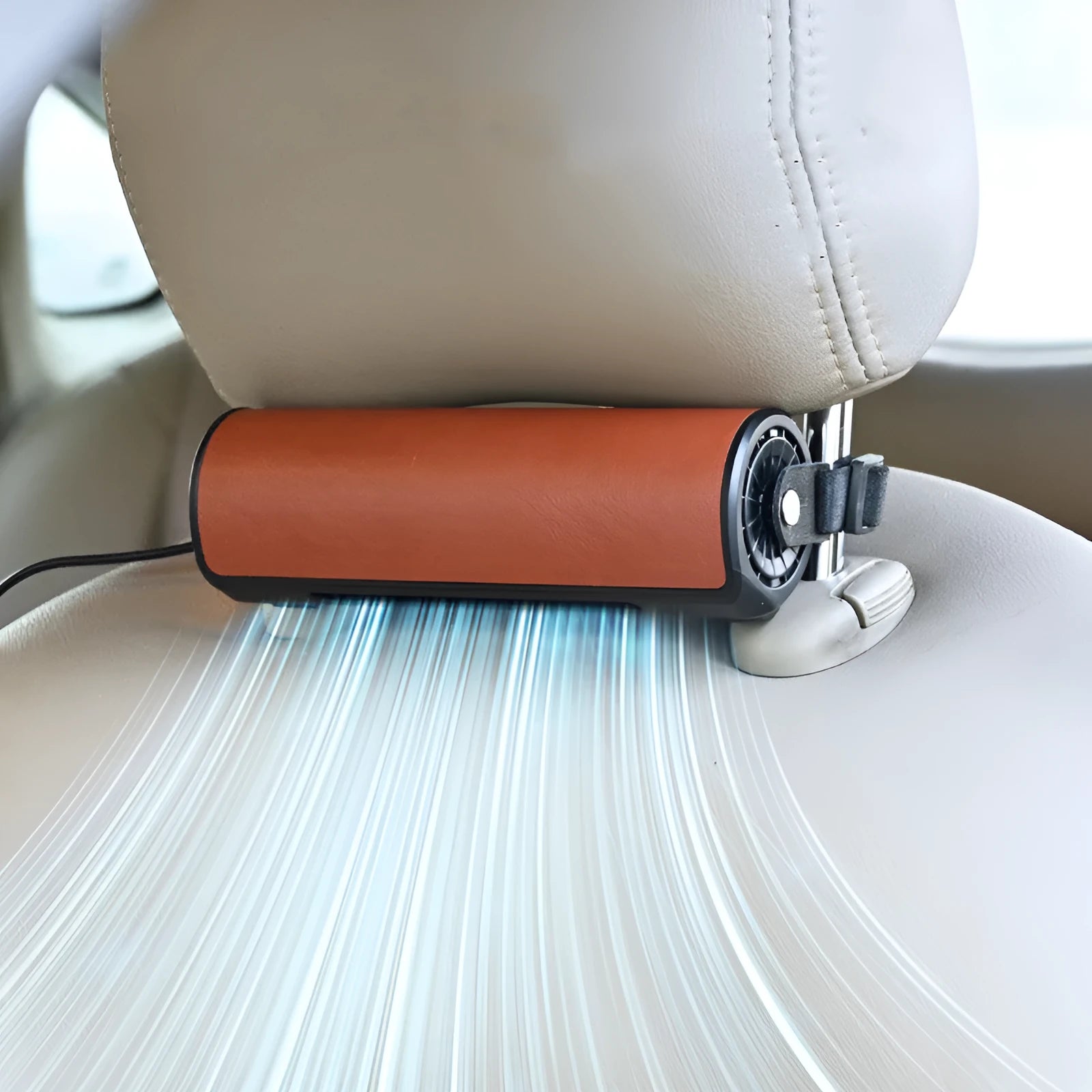 USB-powered black car rear seat fan with long cable next to car interior