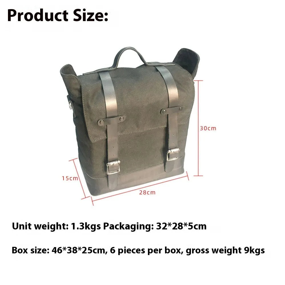 Black waterproof canvas motorcycle side pannier bag with cowhide reinforcement mounted on motorcycle