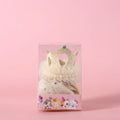 Pet wearing princess crown headdress with floral decoration and attached veil