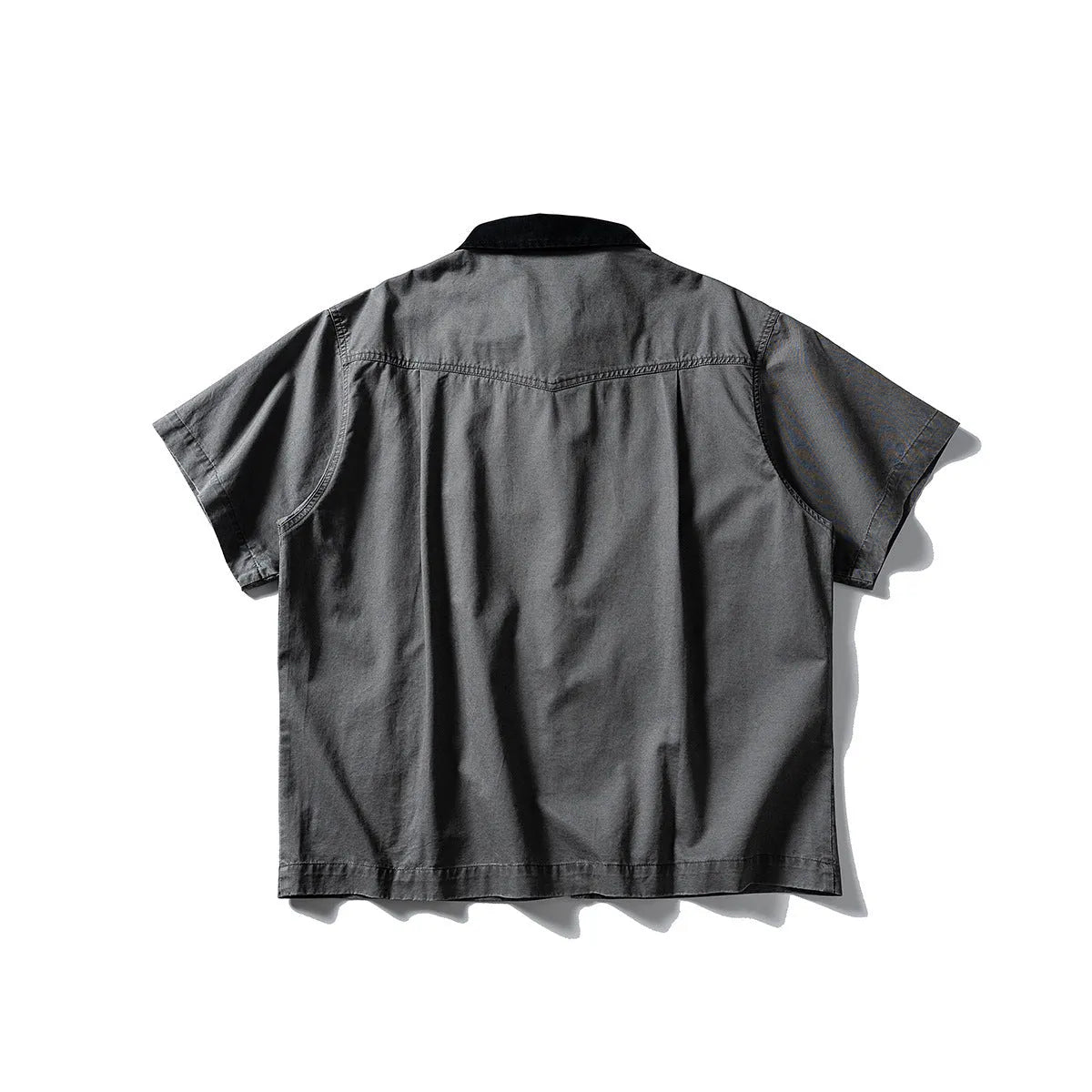 Khaki and grey washed cotton short-sleeved overalls shirt with a loose cardigan fit.