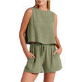Women's apricot coloured sleeveless top and matching drawstring shorts summer set on a hanger.