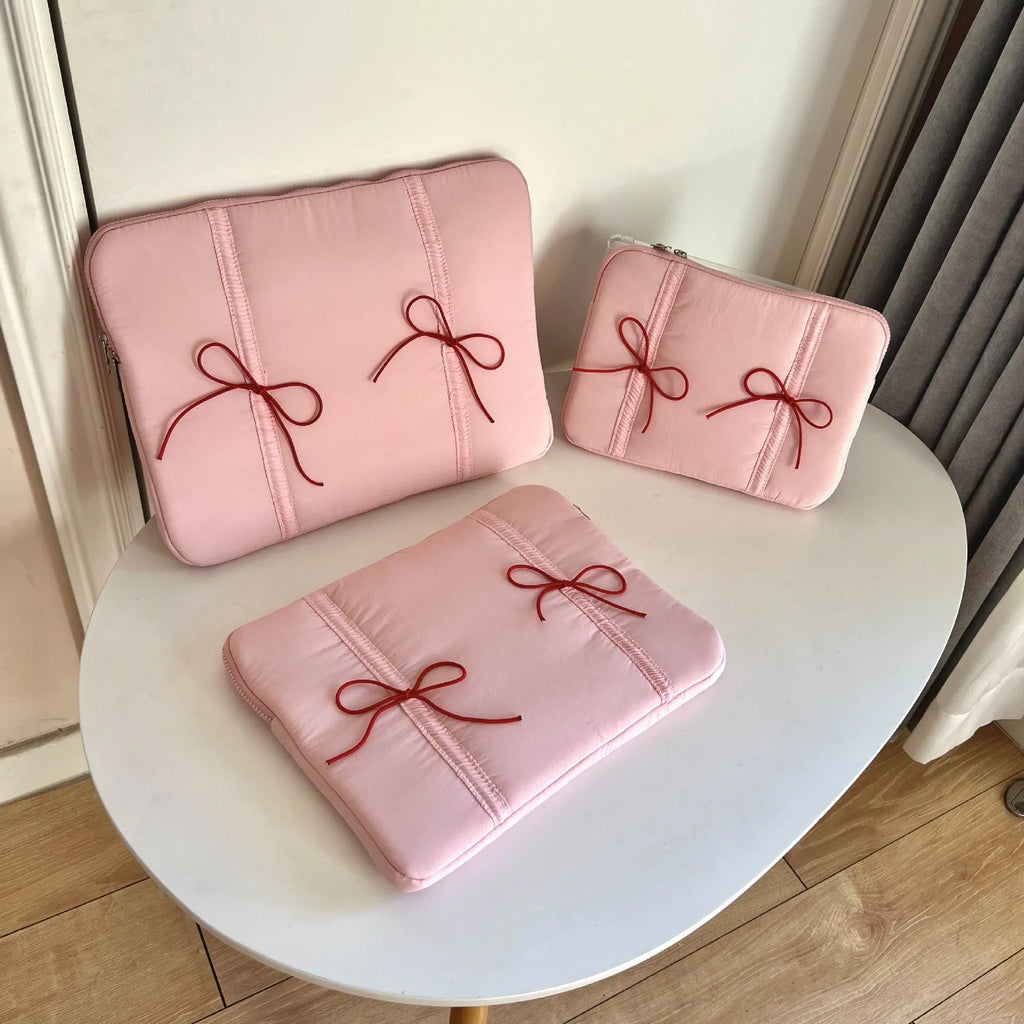 Polyester tablet PC bag with elastic lace bow closure in pink, size 13-14 inches