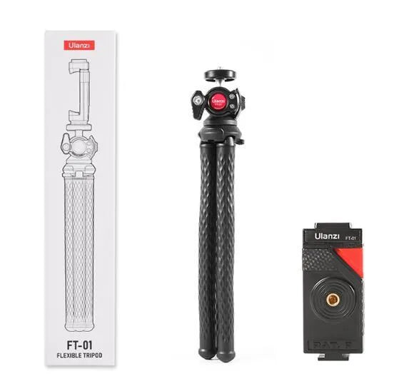 Black octopus-style flexible tripod with mobile phone clip extended on a table.