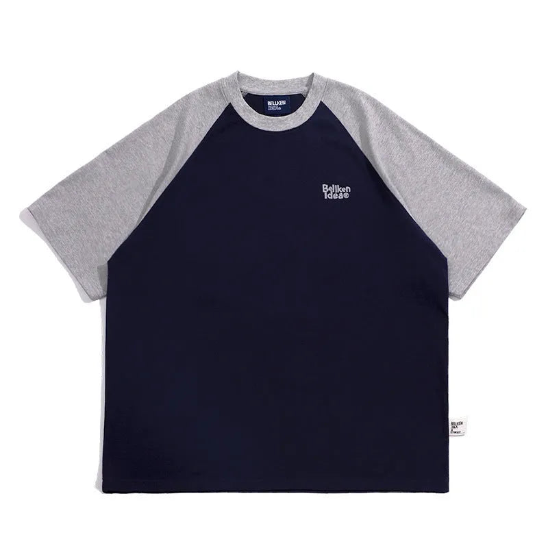Men's blue Japanese junior style raglan sleeve t-shirt with loose fit on hanger