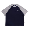 Men's blue Japanese junior style raglan sleeve t-shirt with loose fit on hanger