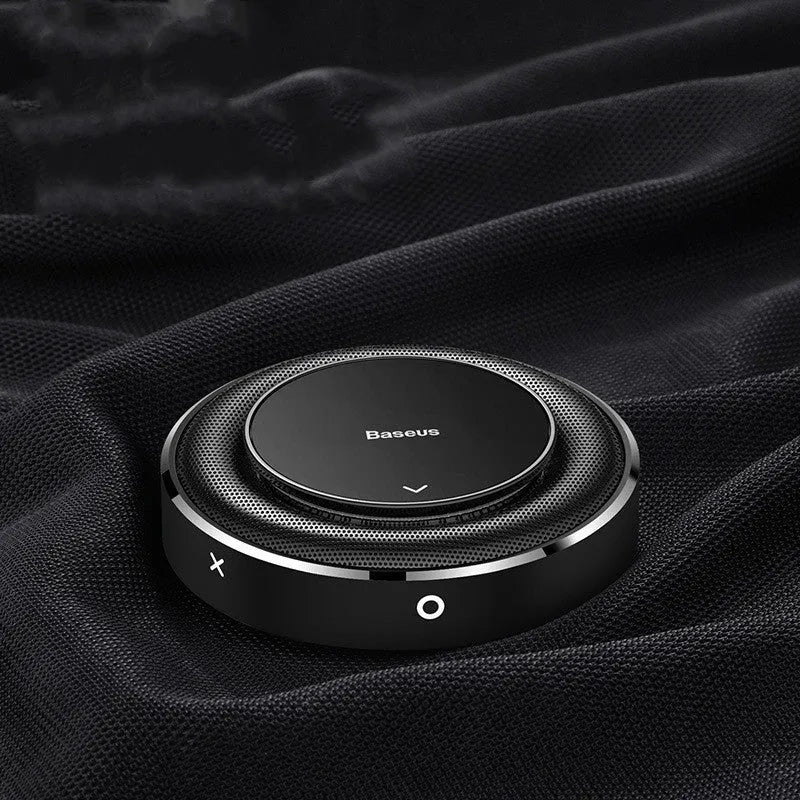 Aluminium alloy car fragrance diffuser in black, red, or silver with round design and four aromatic tablets
