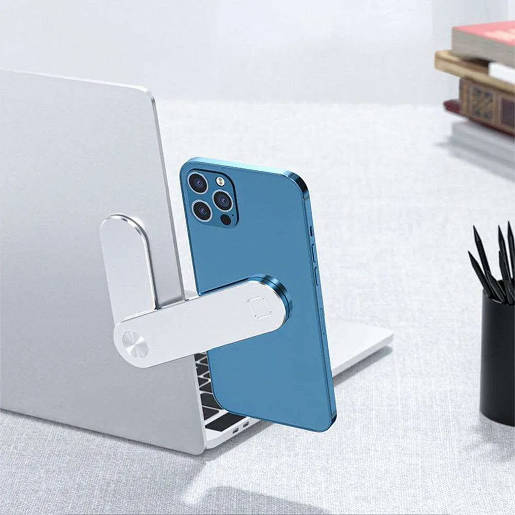 Black aluminium laptop phone holder with magnetic mount attached to monitor