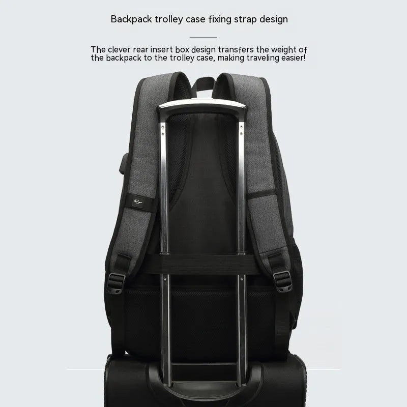 Grey nylon backpack with USB charging port and trolley case strap showing 32x15x46cm dimensions