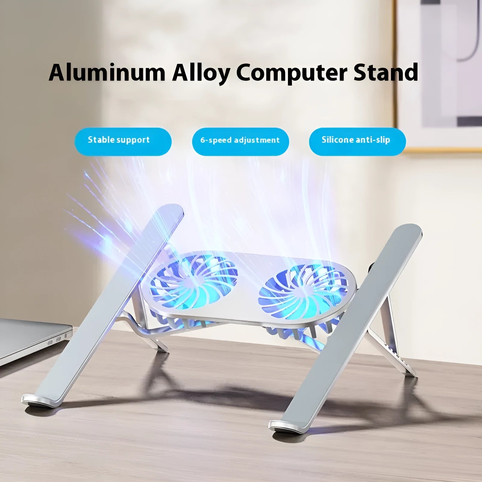 Silver aluminium laptop cooling stand with twin fans in folded position beside cloth carrying bag