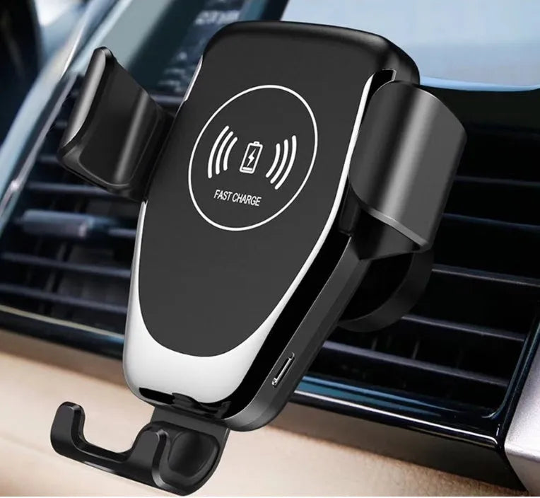 Black car wireless charger mounted on vent holding an iPhone for hands-free charging