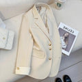 Women's loose fit Korean style trench coat in milky white with pocket detailing