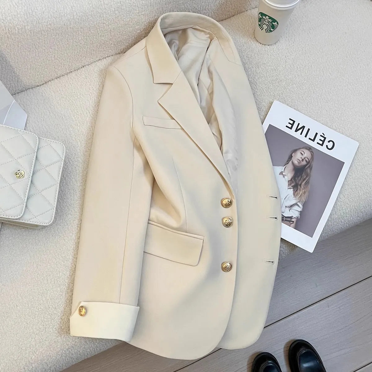 Women's loose fit Korean style trench coat in milky white with pocket detailing