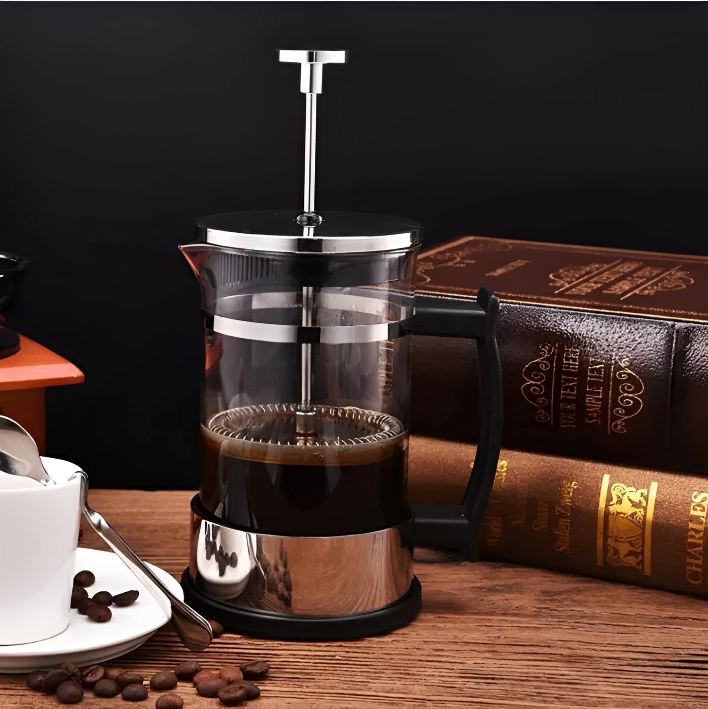 Compact stainless steel and glass drip coffee maker with 350ml capacity.