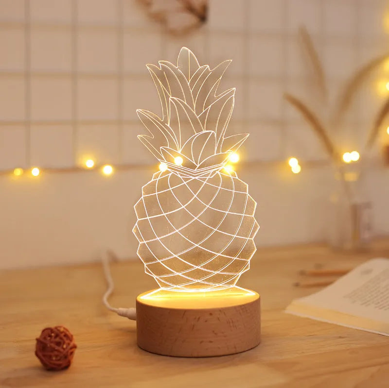 Wooden and acrylic pineapple-shaped USB table lamp with dimmer switch on a bedside table.
