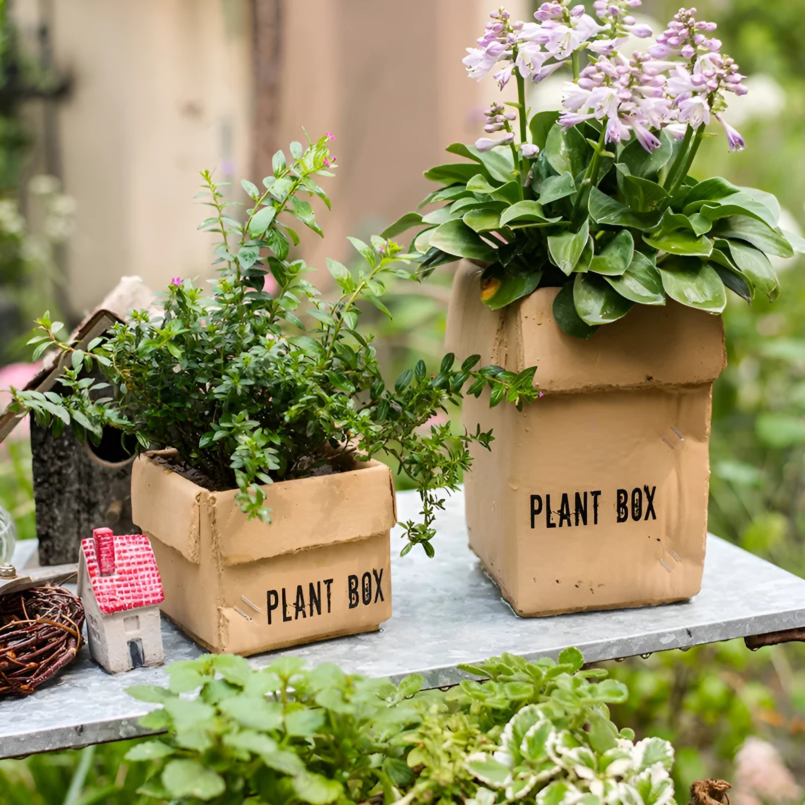 Cement flowerpot with perforated base and imitation carton paper texture for indoor planting
