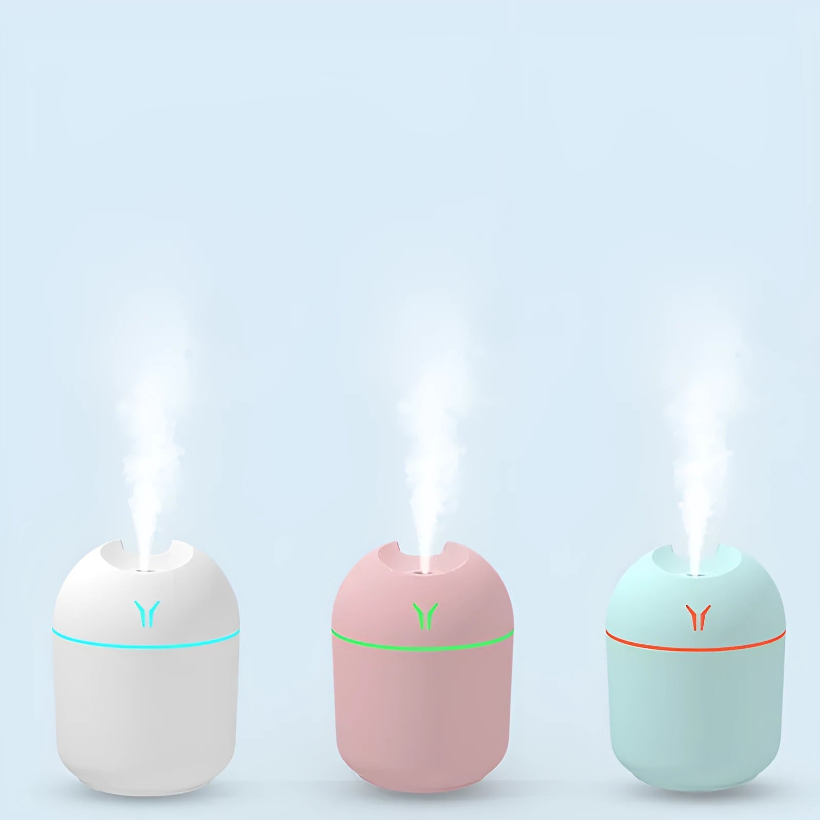 Round desktop humidifier with USB cable in ivory white, sky blue, or girlish pink colours