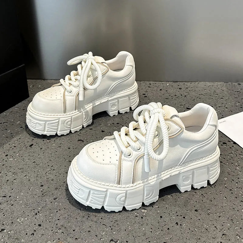 Women's beige and pink muffin bottom leather casual shoes with a rubber foam sole.