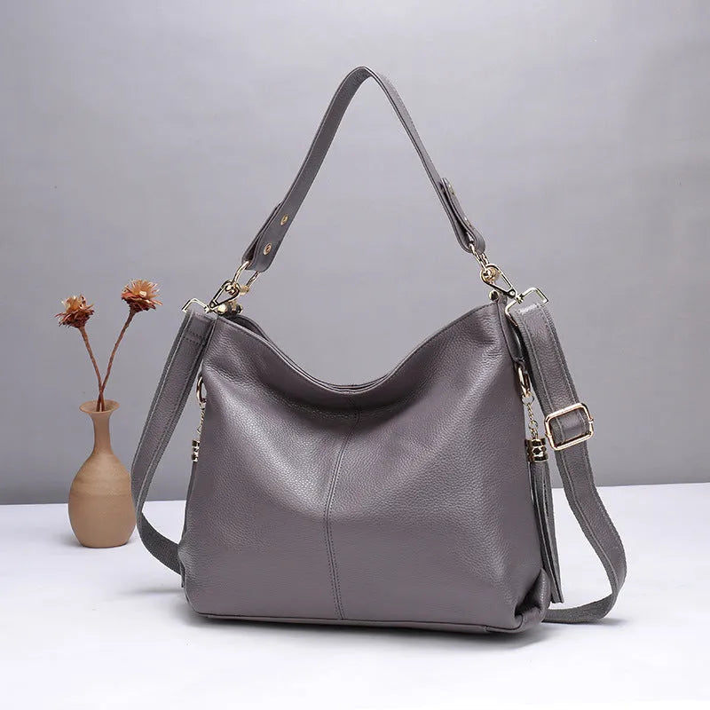 Genuine leather crossbody bag in vertical square shape with multiple compartments and sandwich pocket