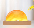 Sunrise Oriental wooden base table lamp with natural crystal salt shade and built-in wireless phone charging.