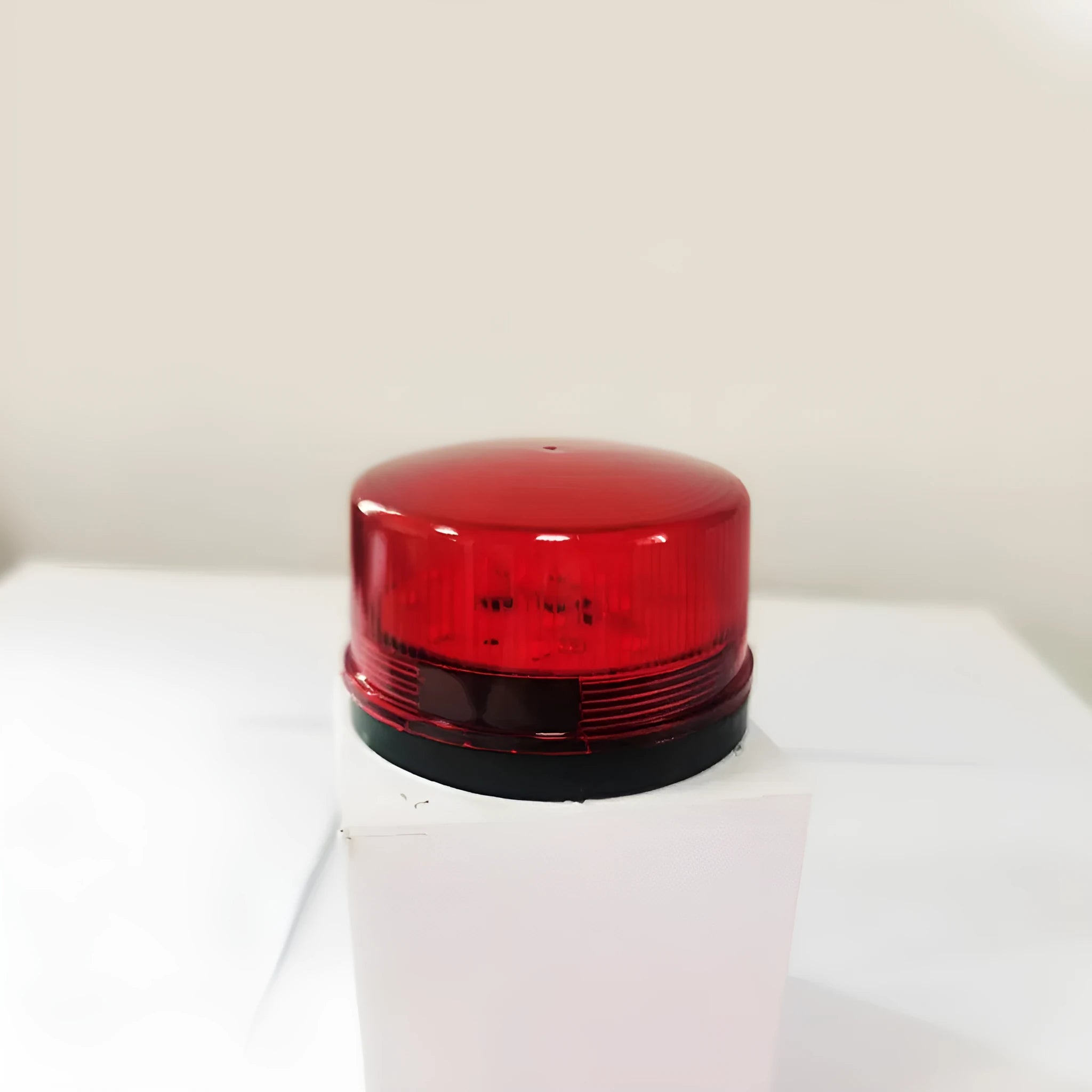24V warning alarm light unit showing compact 73mm diameter design with LED strobe and audible alarm components