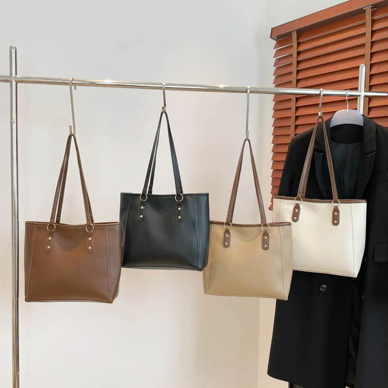 PU leather tote bag in urban simplicity style with internal organisation pockets