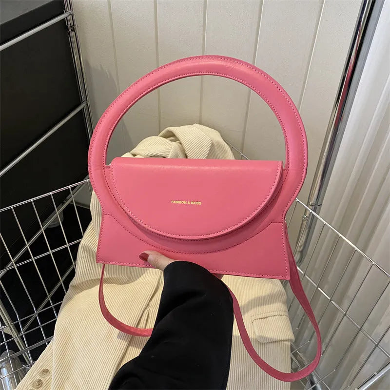 PU leather messenger bag with sandwich pockets and visible stitching in multiple colour options