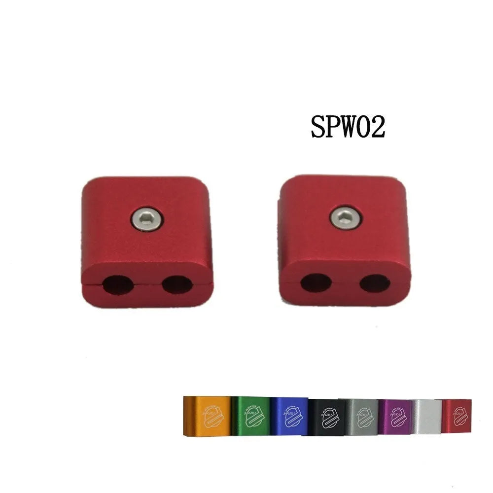 Three metal car fastening clamps in different colours for vehicle modification projects