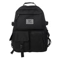 Black student backpack with three-dimensional pockets showing computer compartment