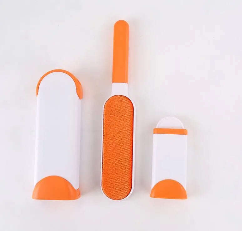 Blue reusable pet hair removal brush with sticky flannel head placed in its self-cleaning base.