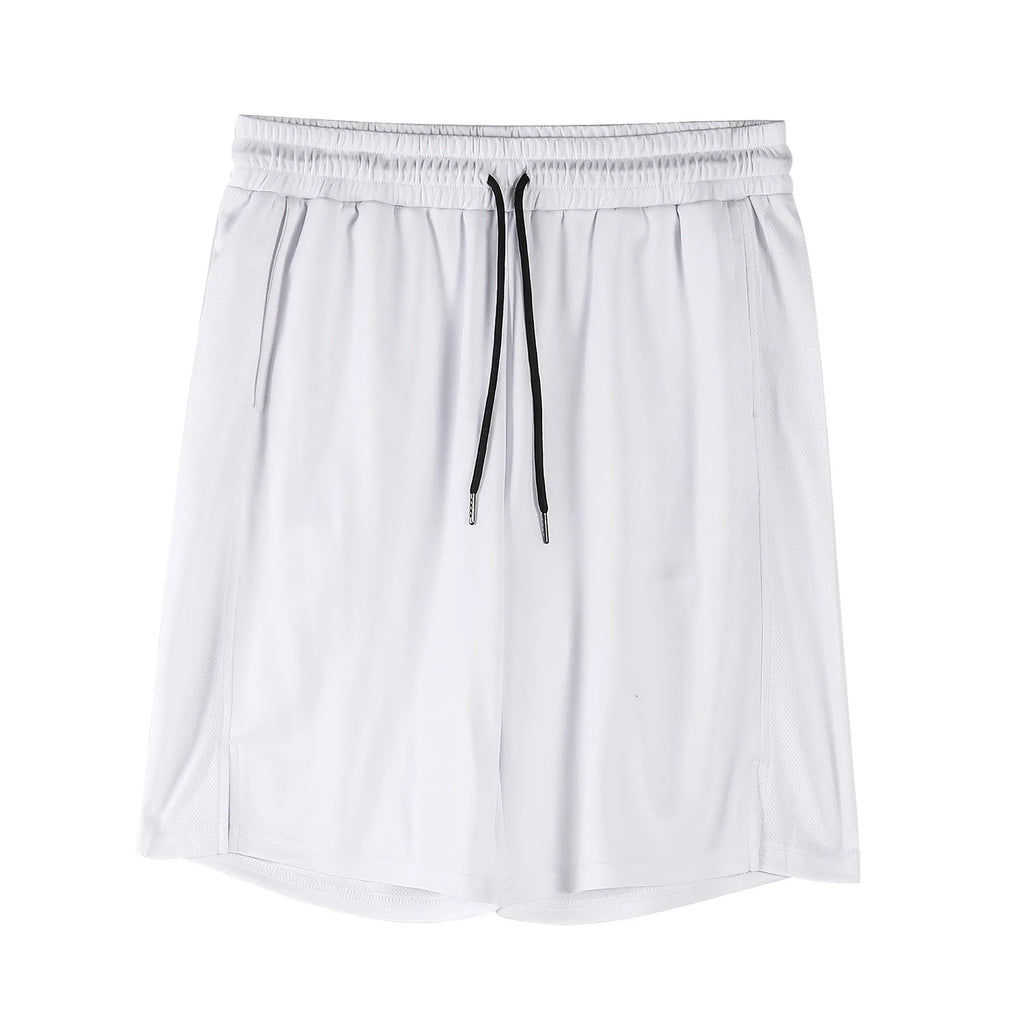 Man wearing black loose-fit quick-dry mesh fitness shorts with an elastic waistband.