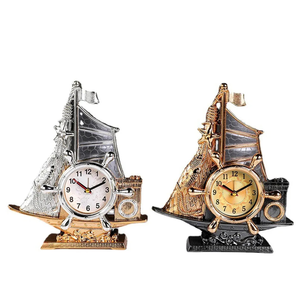 Creative plastic alarm clock in gold or silver finish for bedroom decor.
