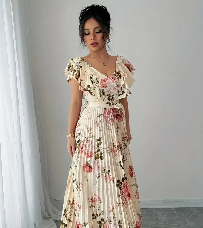 Apricot floral print V-neck dress with ruffled sleeves and a voluminous high-waisted swing skirt.