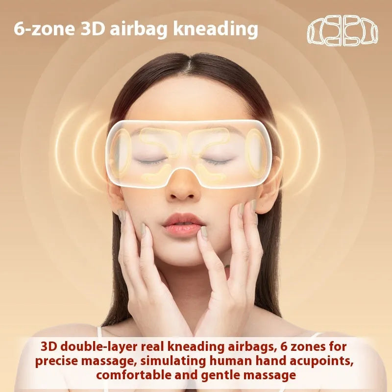 White rechargeable eye massager for hot compress and airbag massage relief