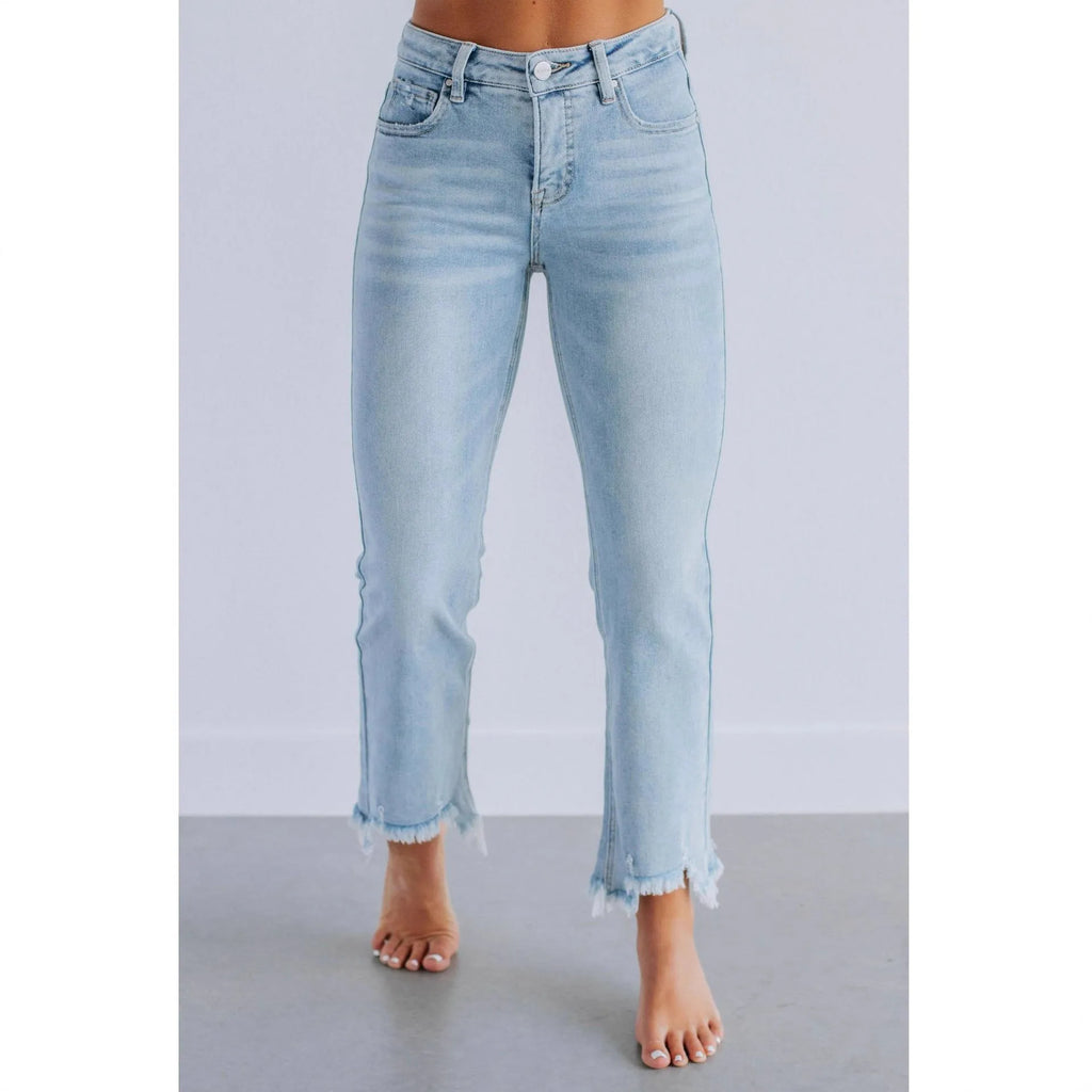 Casual women's denim trousers with hand-worn detailing in dark blue cotton fabric