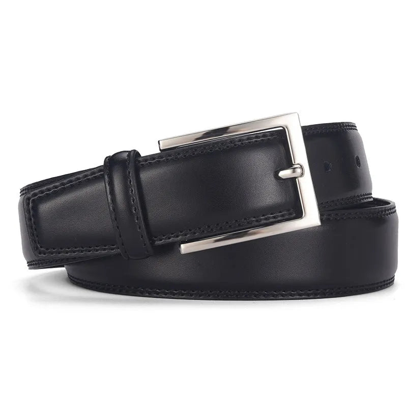 Men's classic black genuine leather belt with a silver-toned alloy pin buckle on a flat surface.