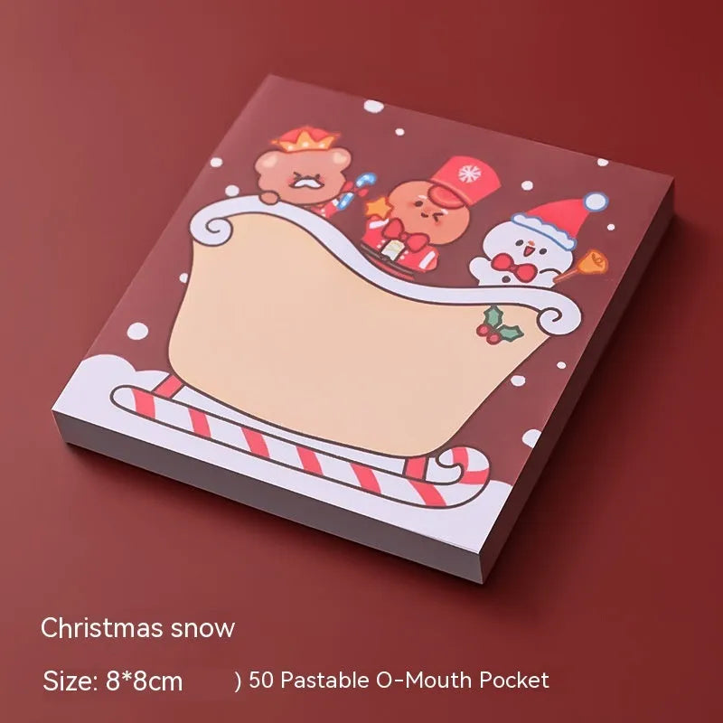 Christmas sticky notes pad with Santa Claus, elf, gift, sled, snowman, bear, house, and crystal ball designs