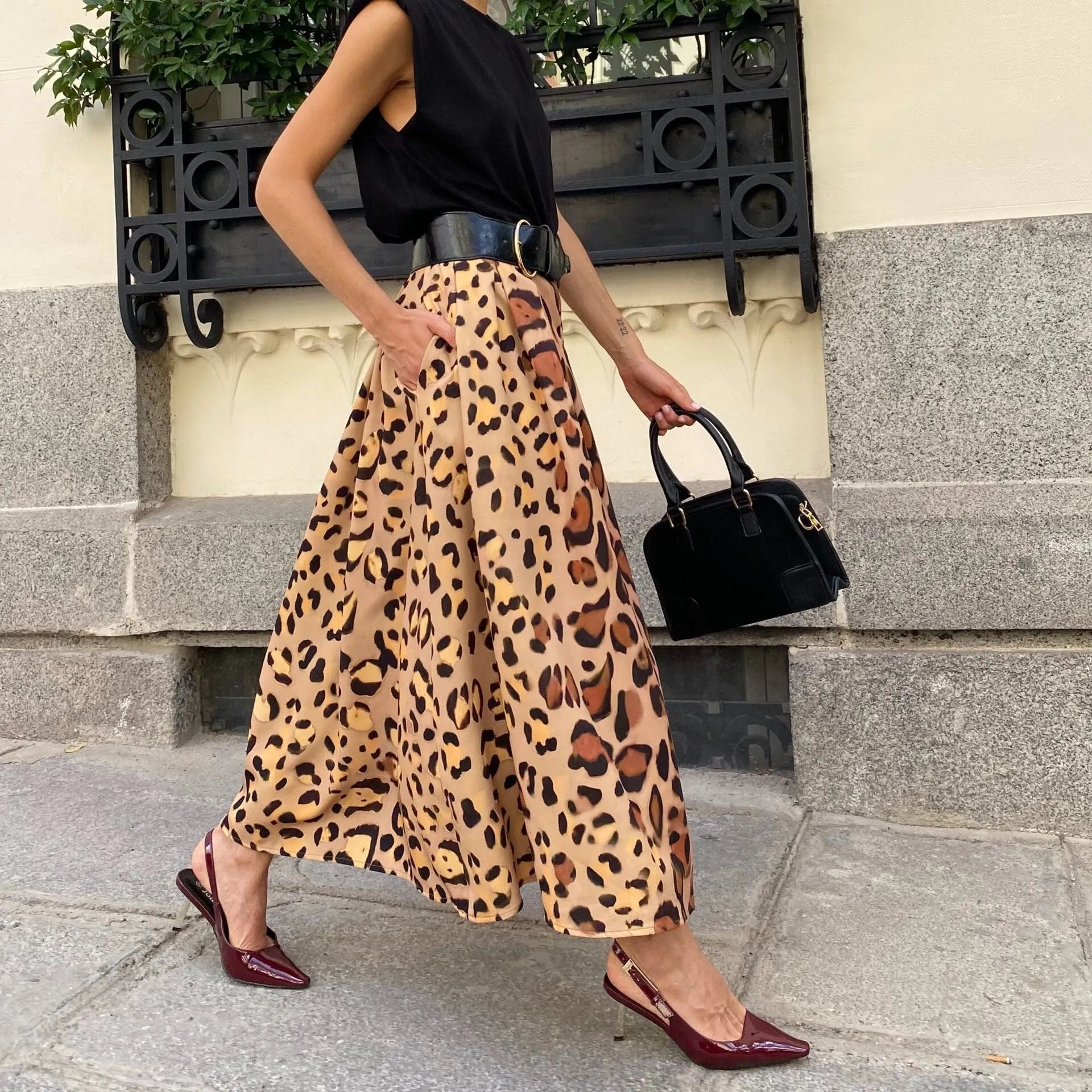 Brown leopard print women's A-line long skirt with big hem design on inelastic polyester fabric