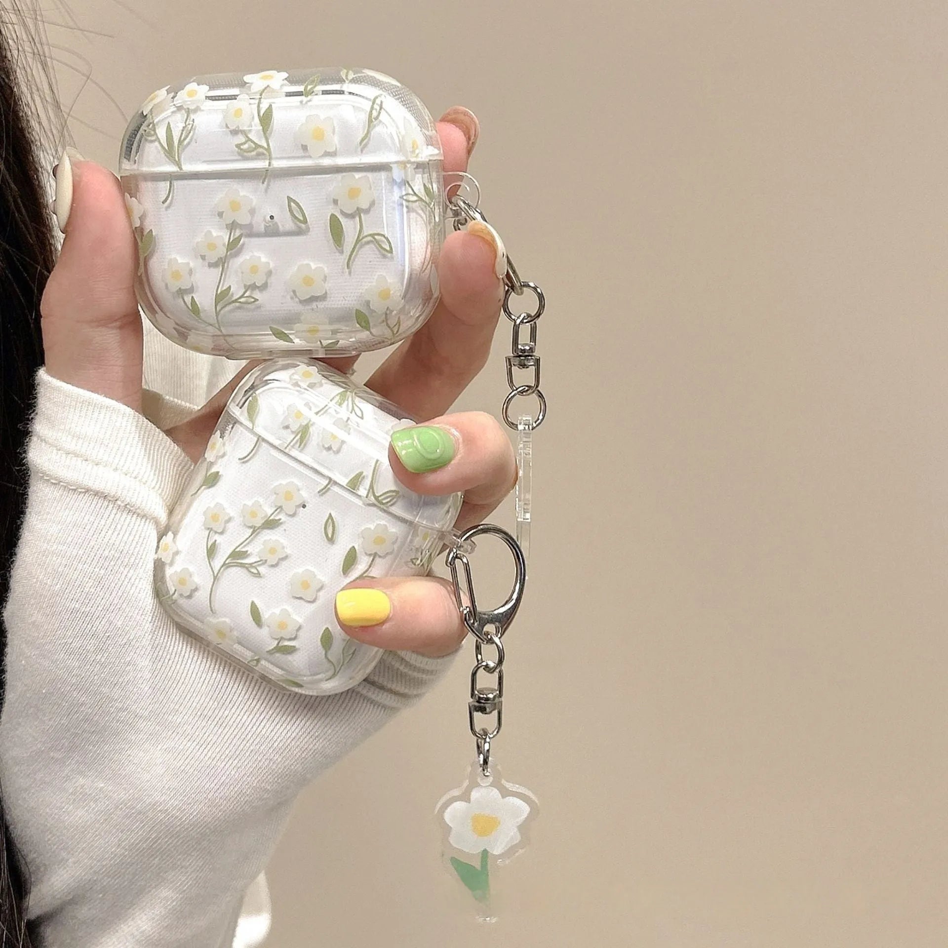 White floral design on clear TPU protective cover for Apple AirPods charging case