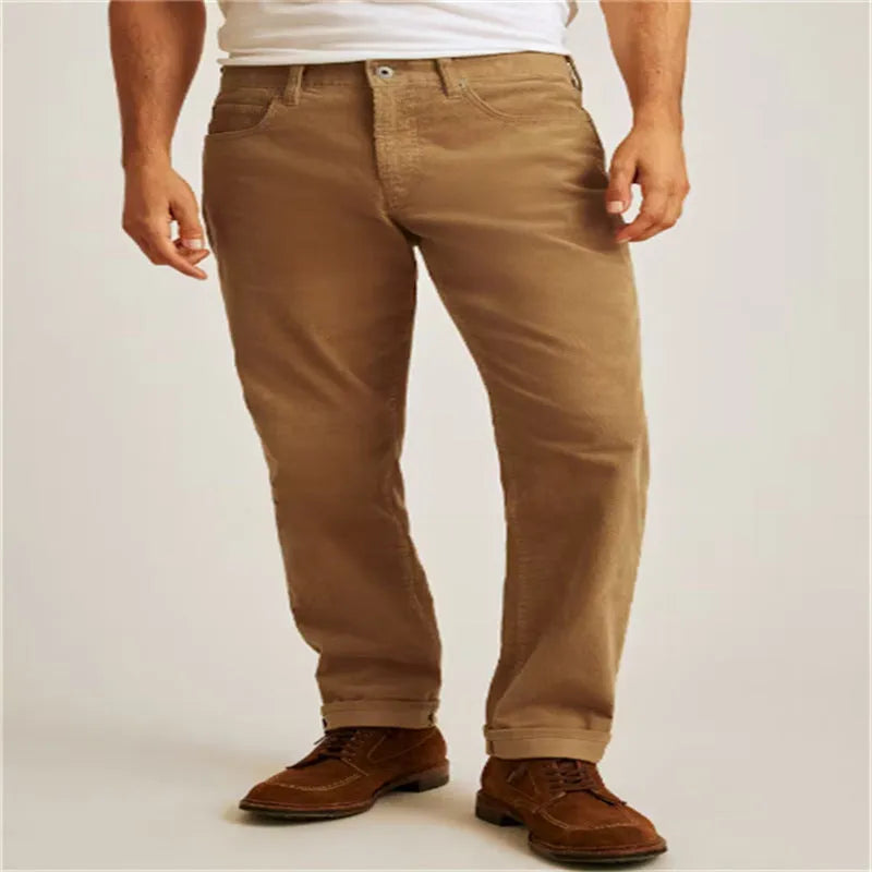 Green corduroy trousers with loose fit straight leg design and zip fly closure