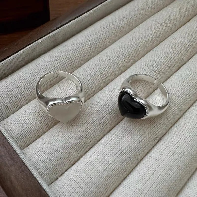 Adjustable sterling silver ring with black agate heart centrepiece