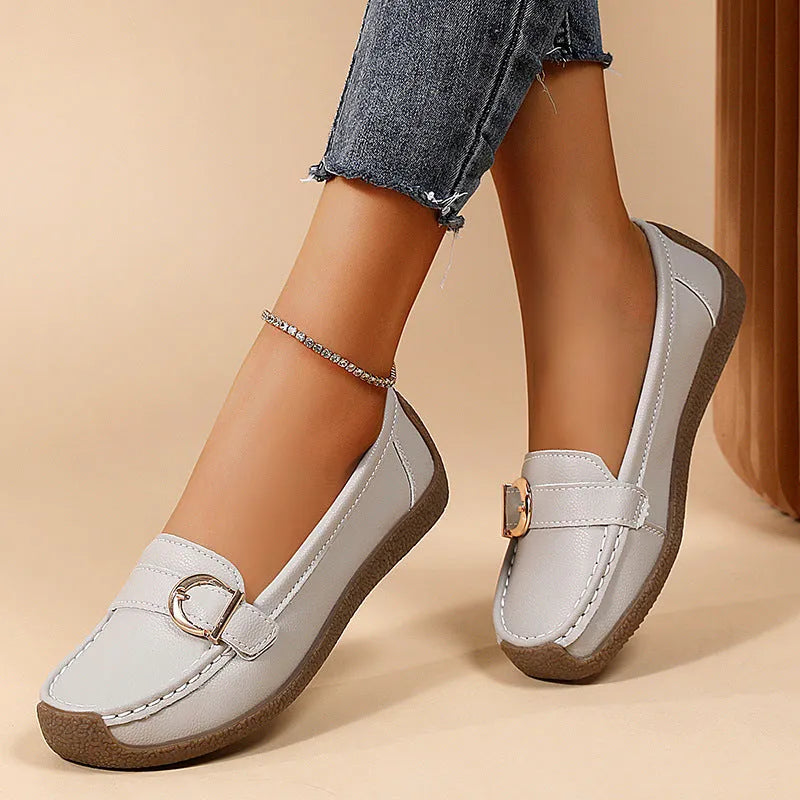 Women's beige casual slip-on loafers with a round toe and flat beef tendon sole.
