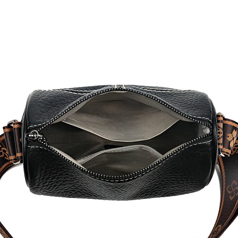 Casual genuine leather cylindrical shoulder bag for women in black, top grain, patchwork, soft texture.