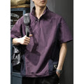 Brown men's loose-fit T-shirt with a half-zip stand collar and short sleeves.