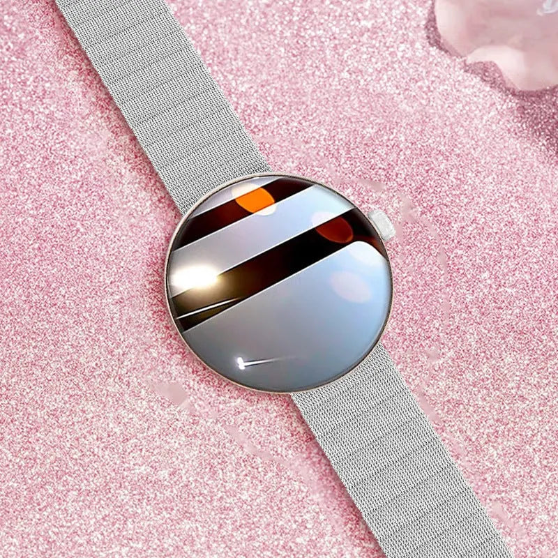 Women's smart watch with circular aluminium alloy case and metal strap showing colour touch screen