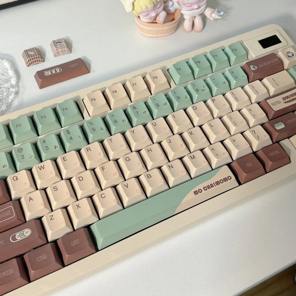 Matcha green theme mechanical keyboard keycaps with ergonomic CAP adaptive shafts on a white background.